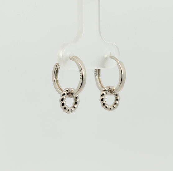 Pearl earrings, flower-shaped, adorned with white zircons