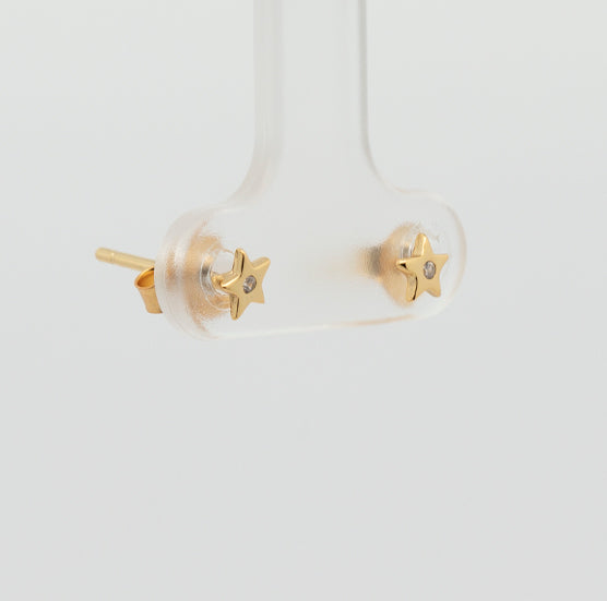 Pearl earrings, flower-shaped, adorned with white zircons