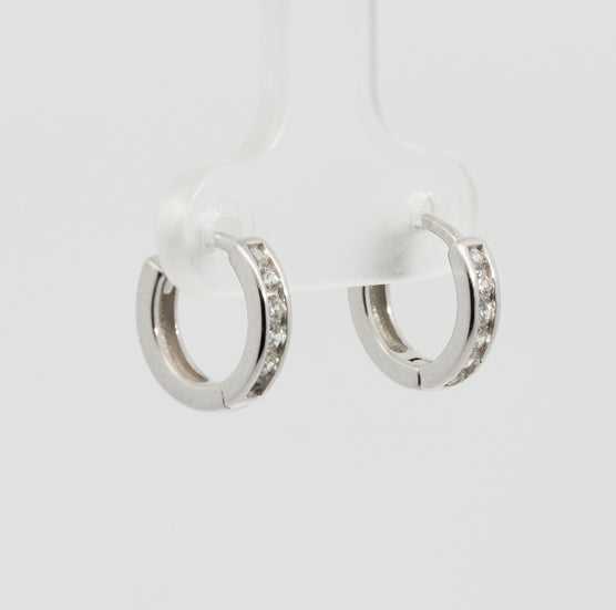 Pearl earrings, flower-shaped, adorned with white zircons