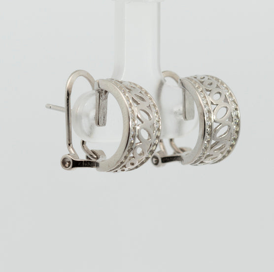 Pearl earrings, flower-shaped, adorned with white zircons