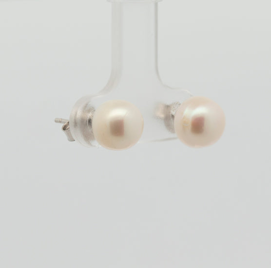 Pearl earrings, flower-shaped, adorned with white zircons