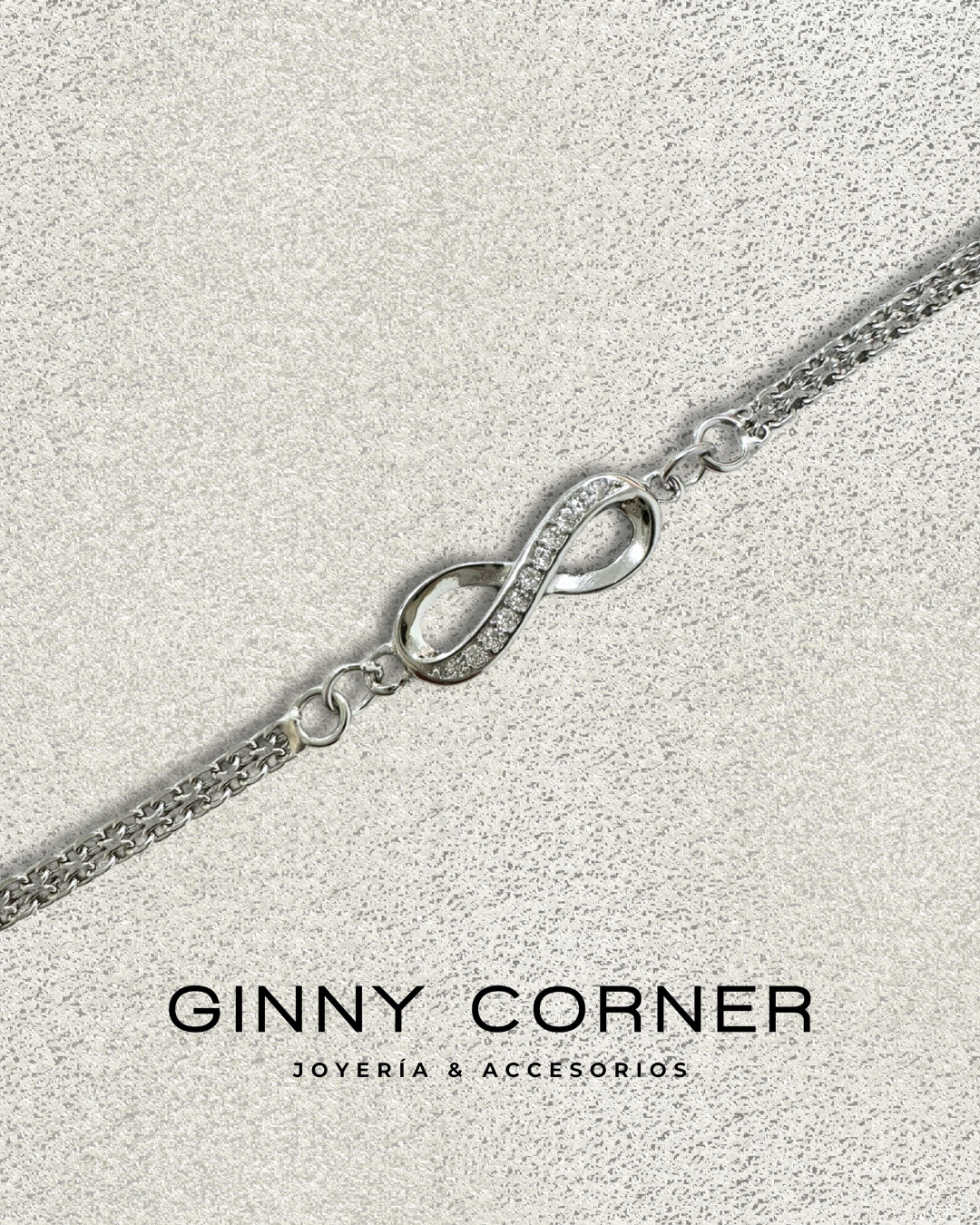 Infinity bracelet in silver with white zircons
