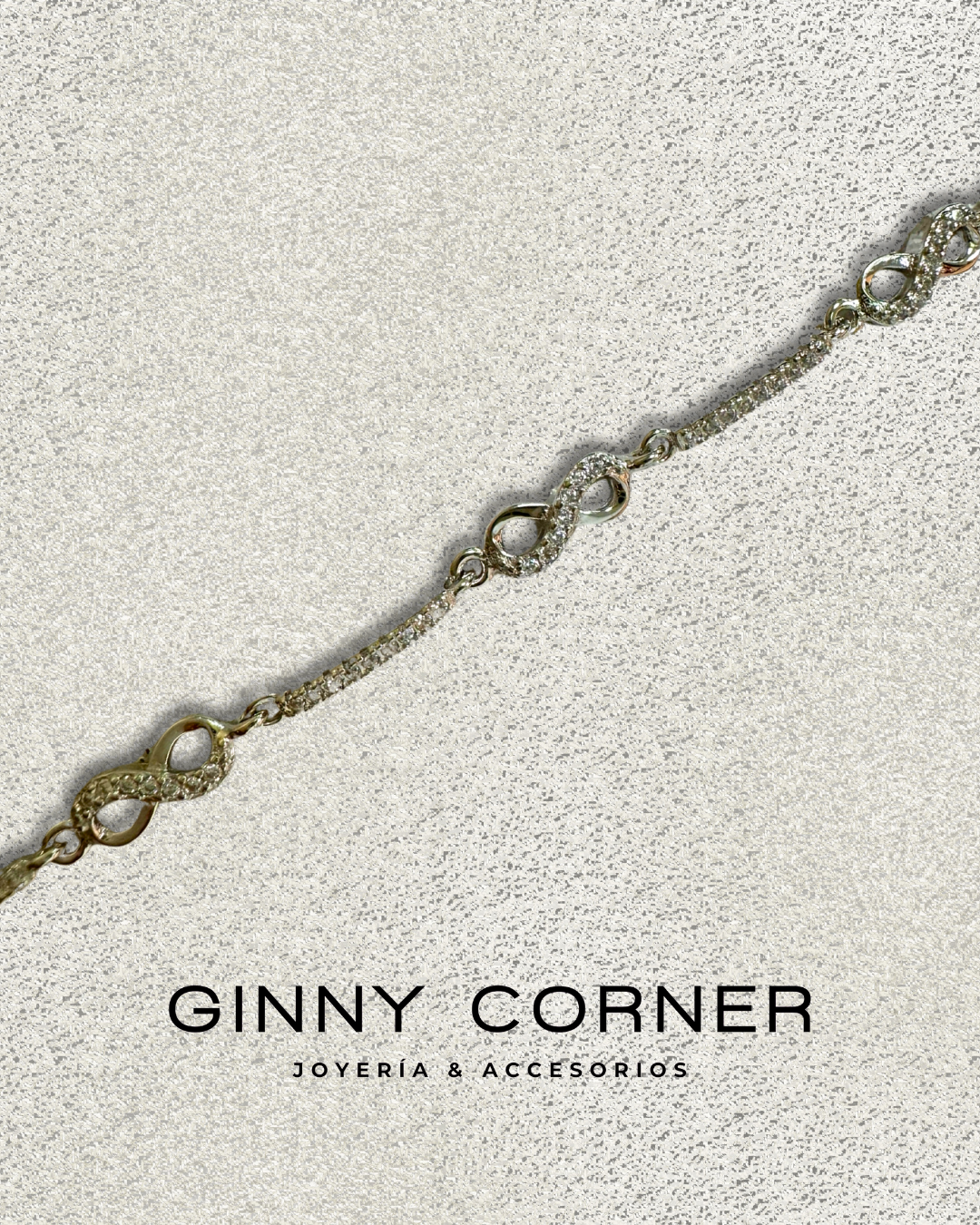 Infinity bracelet in silver with white zircons