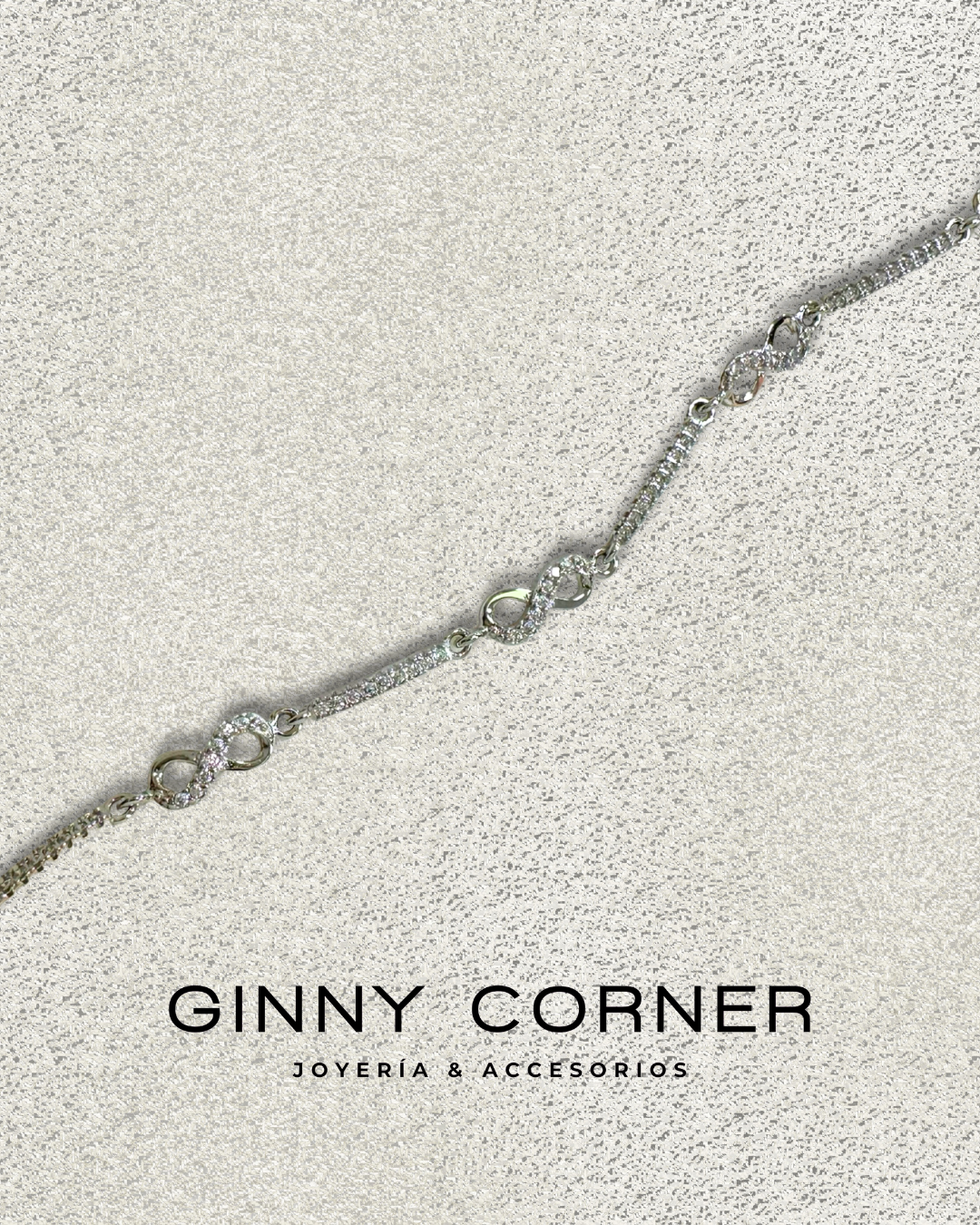 Infinity bracelet in silver with white zircons
