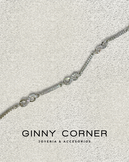 Infinity bracelet in silver with white zircons