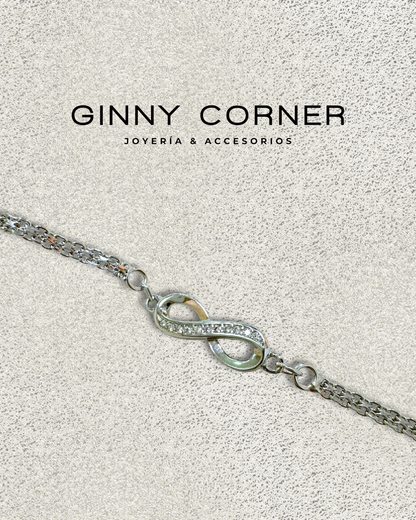 Infinity bracelet in silver with white zircons