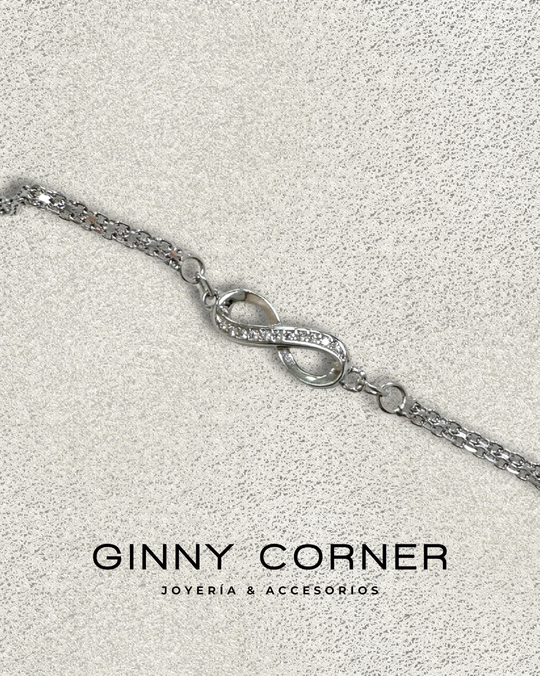Infinity bracelet in silver with white zircons