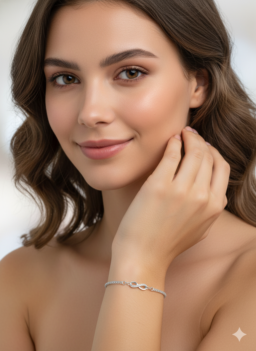 Infinity bracelet in silver with white zircons