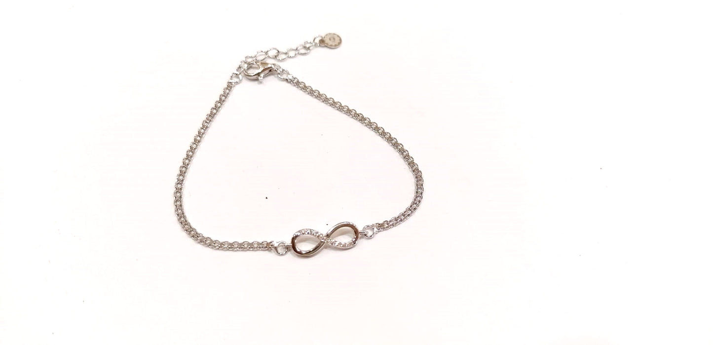 Pulsera infinito en plata de ley con Swarovski